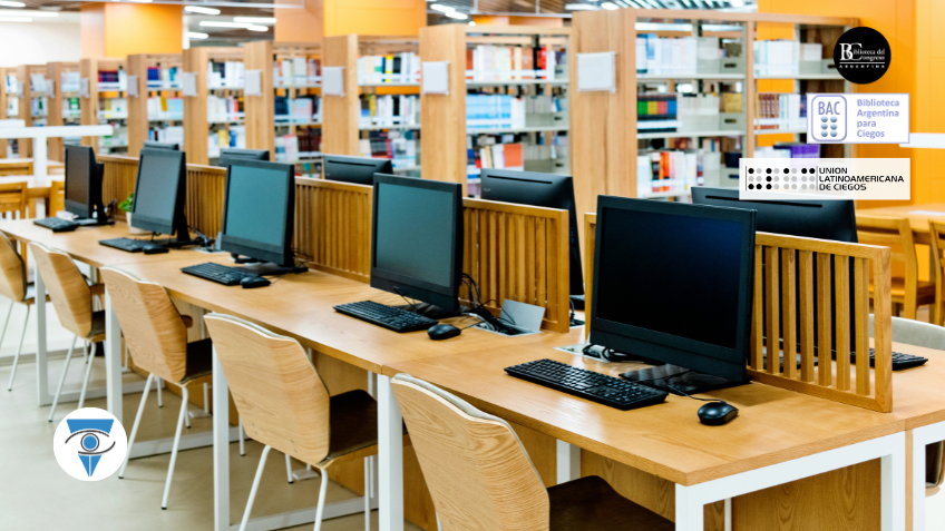 Foto de una biblioteca con libros y escritorios con computadoras